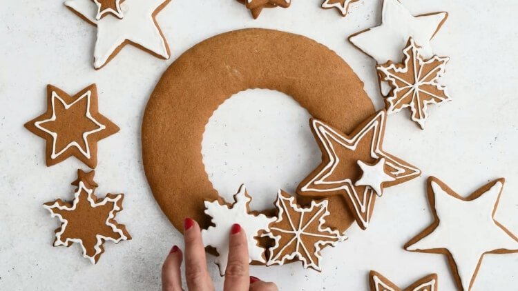 glue cookies on christmas gingerbread wreath
