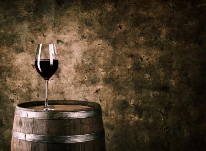 glass-of-red-wine-on-barrel-home-cellar-design-ideas