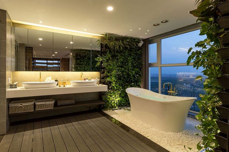 modern bathroom with freestanding bathtub and living walls