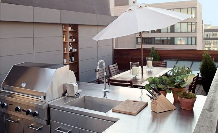 kitchen made of stainless steel on the roof terrace with modern design 