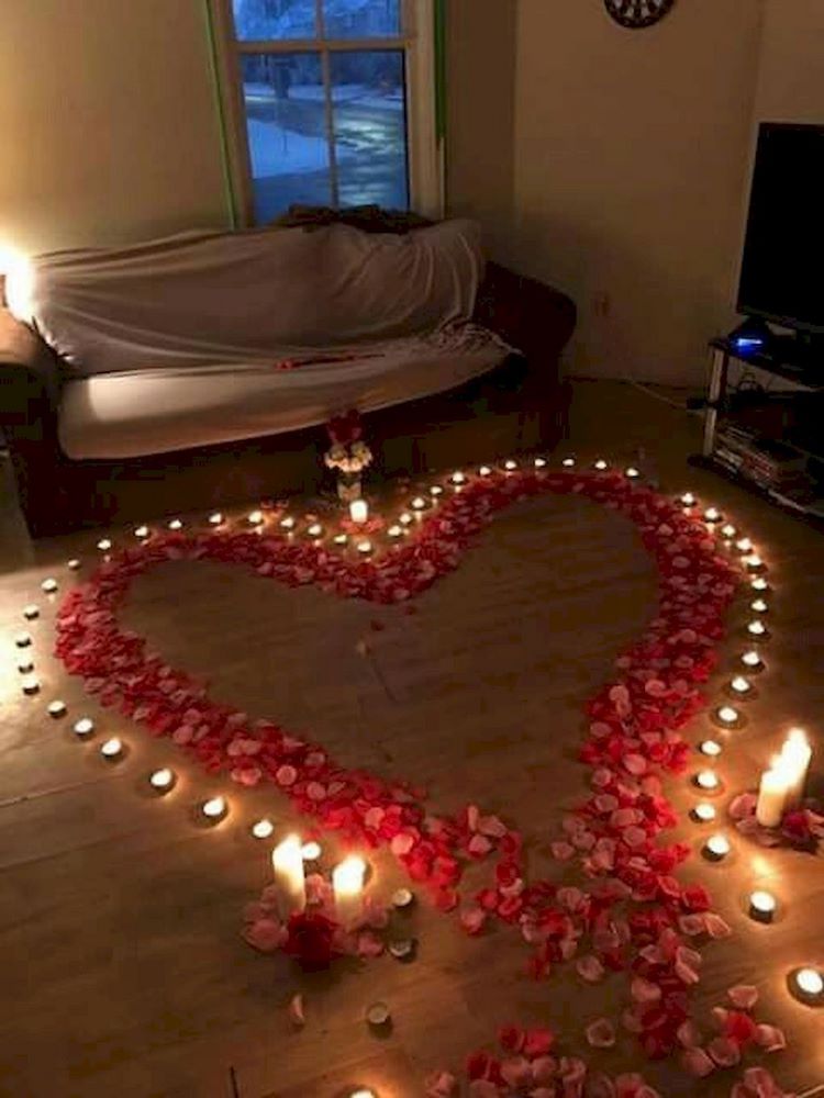 valentines day home decorating ideas candles and petals on the floor 
