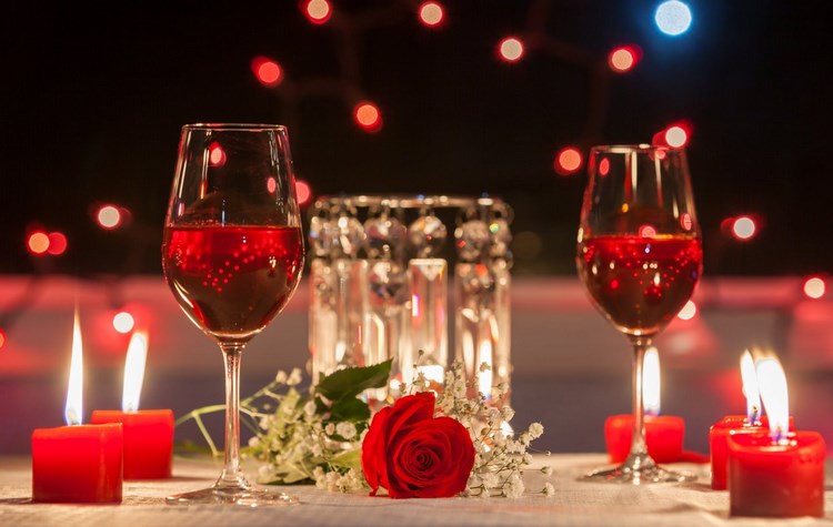 valentines day table setting with flowers and candles