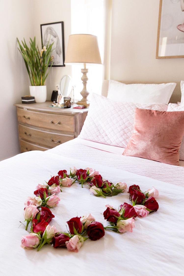 How to use fresh flowers and rose petals as Valentines day bedroom decor