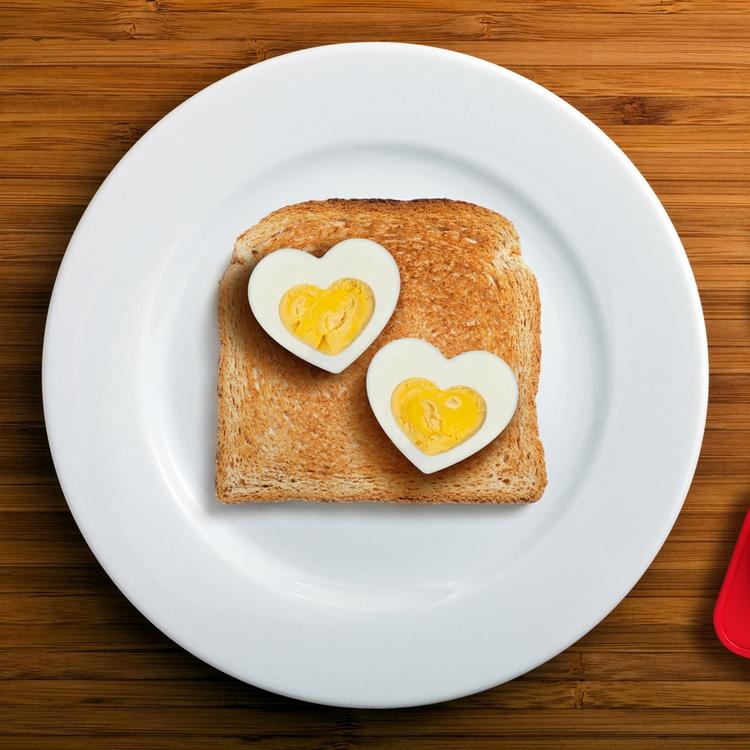 heart shaped boiled eggs on toast