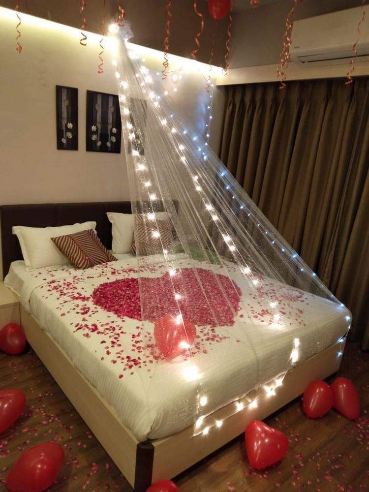 romantic bedroom decor ideas petals balloons canopy