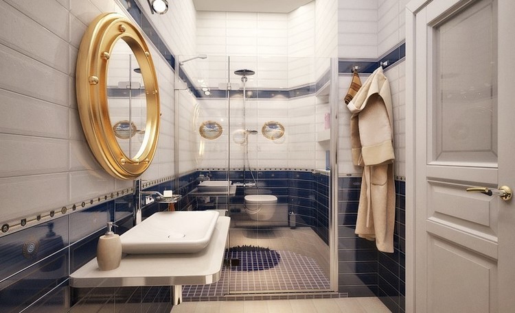 blue and white tiles porthole shaped mirror in bathroom