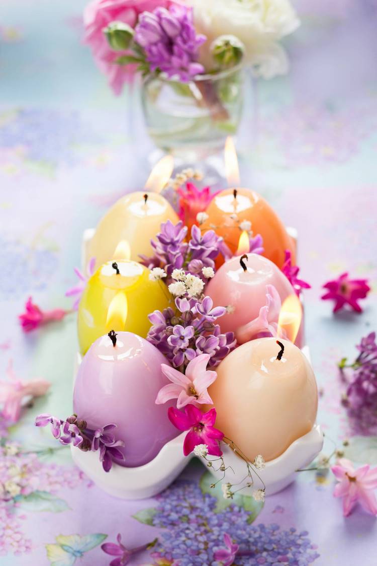 easter table decorating ideas egg shaped candles and flowers