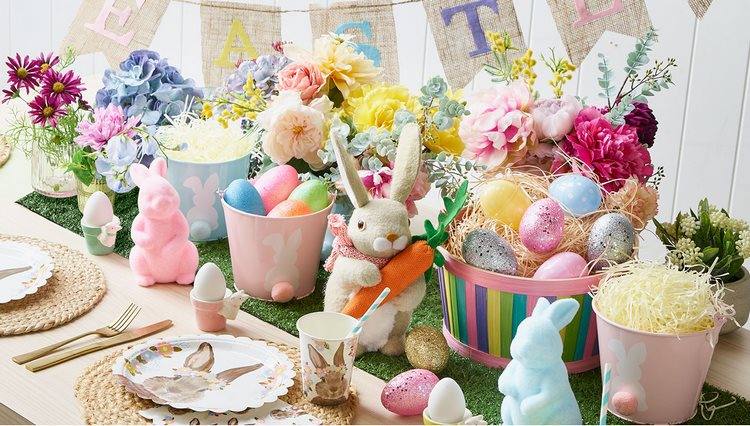 easter table decorations bunnies egg baskets and flowers centerpiece