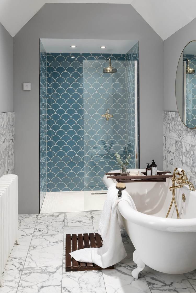 freestanding tub shower enclosure with blue fish scale tiles
