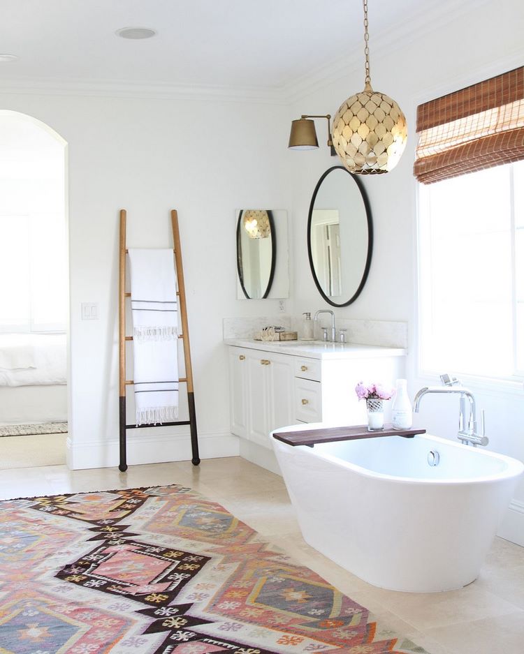 A bath rug can be a decorative element that complements the overall color scheme