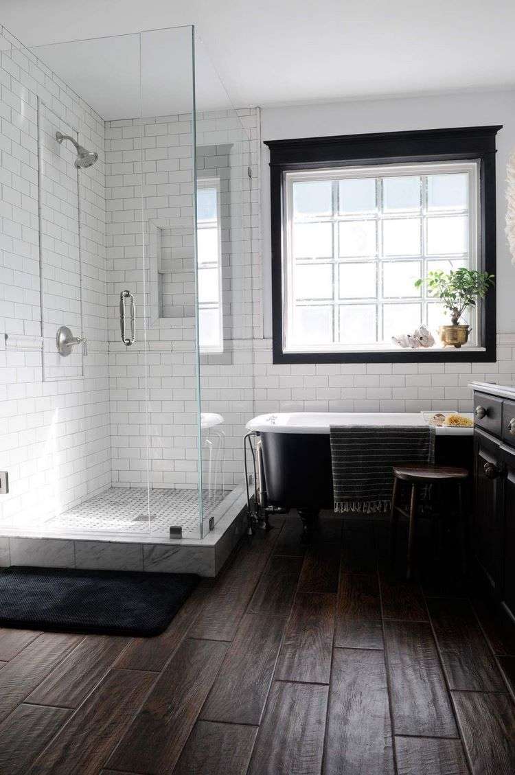 dark flooring in white bathroom contrasting colors in interior design