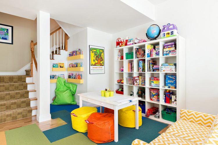 playroom ideas table with poufs shelving system