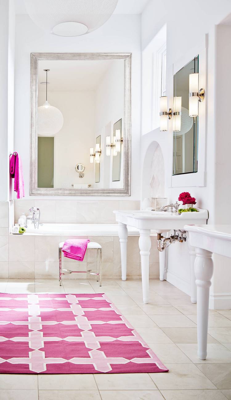 white bathroom pink area rug as accent color in the design