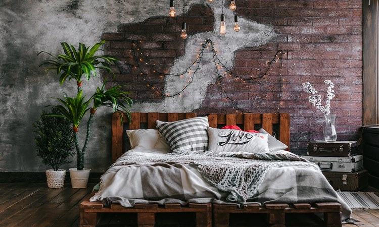 bedroom decor with fairy lights behind the bed