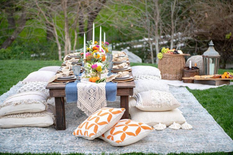Bohemian Backyard party ideas low table rug floor cushions
