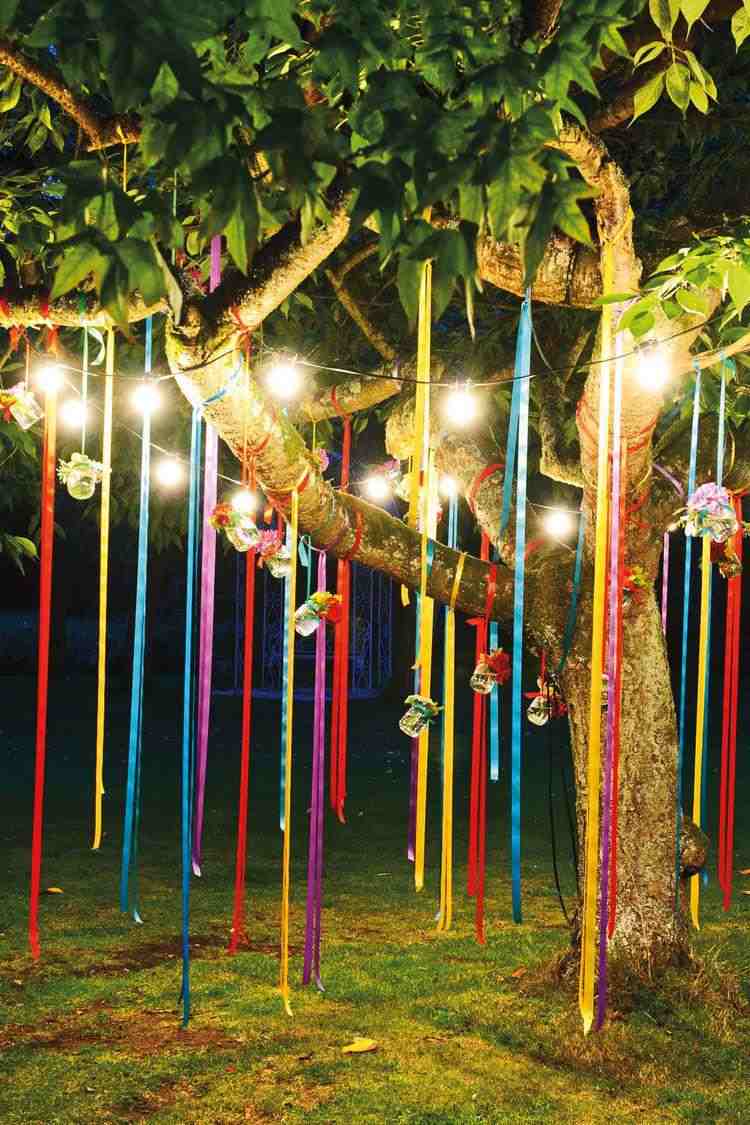 DIY garden party decorations lights and ribbons on tree