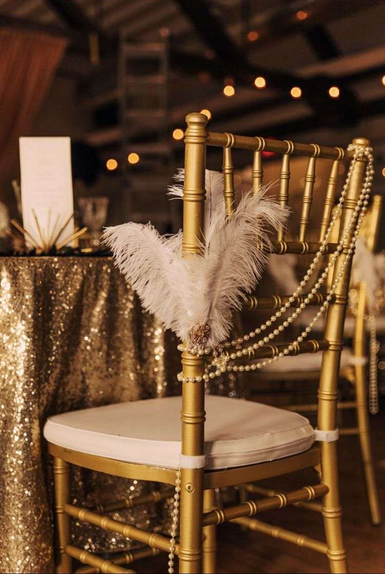 art deco wedding ideas feathers and pearls chair decoration