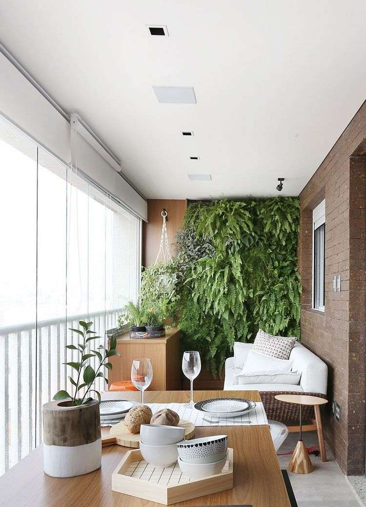 balcony design ideas green wall sofa and bar counter