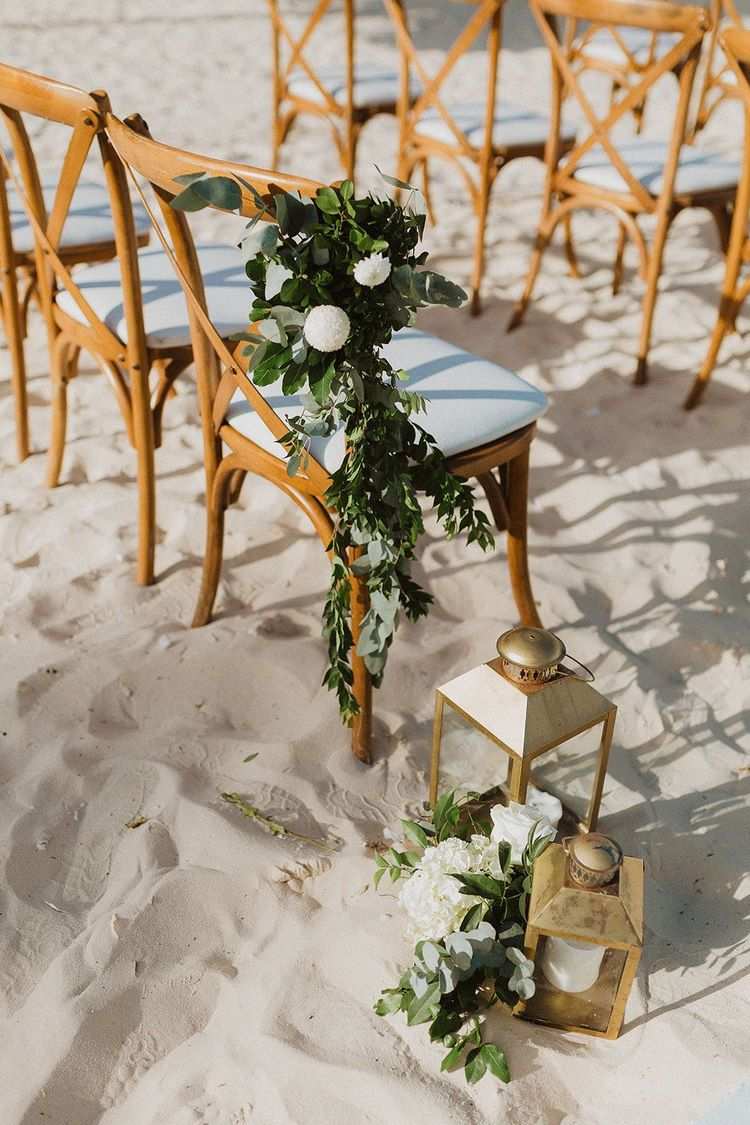 beach wedding ideas chair decoration with flowers