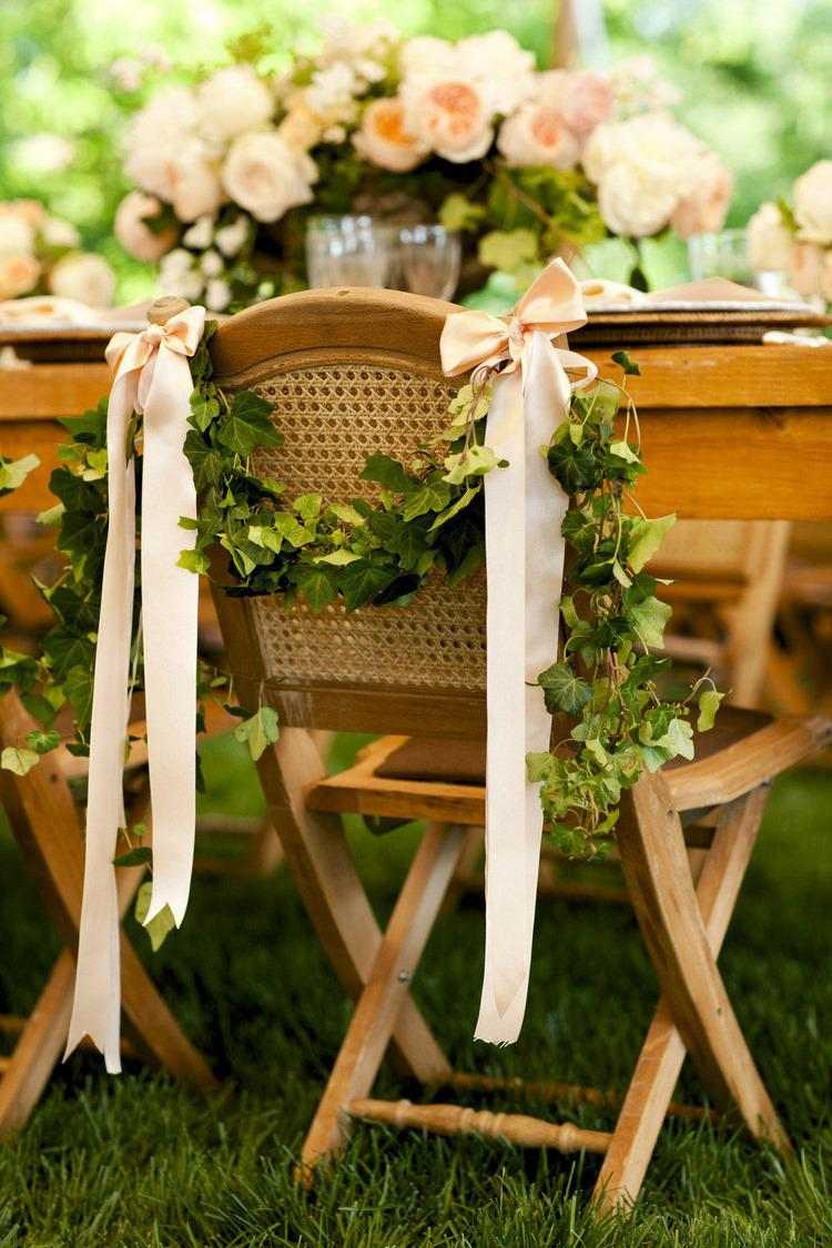 wedding chair decor ideas greenery garland and satin ribbons