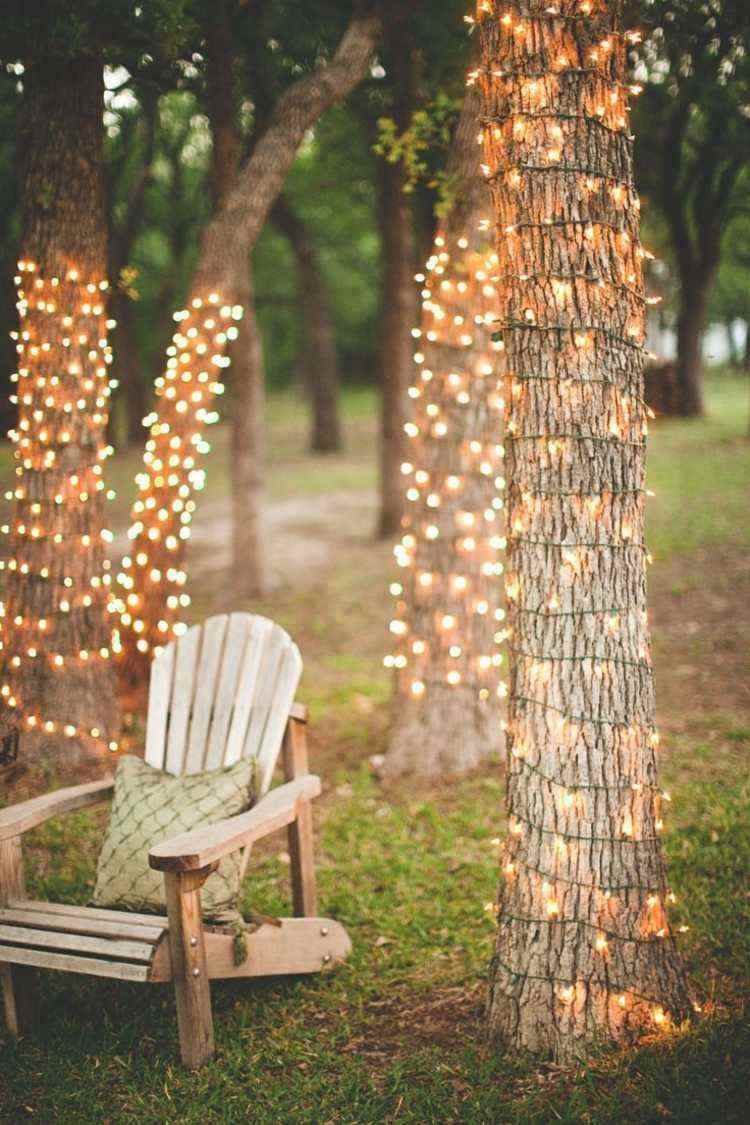 garden party decor ideas string lights wrapped around trees