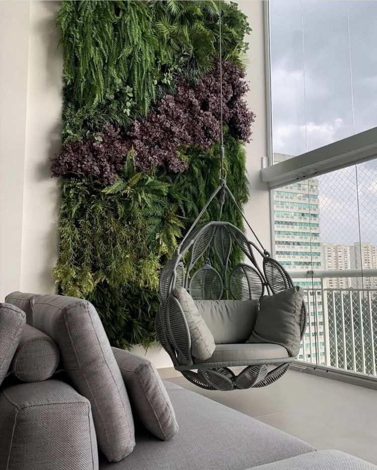 green balcony wall and hanging chair exterior design ideas
