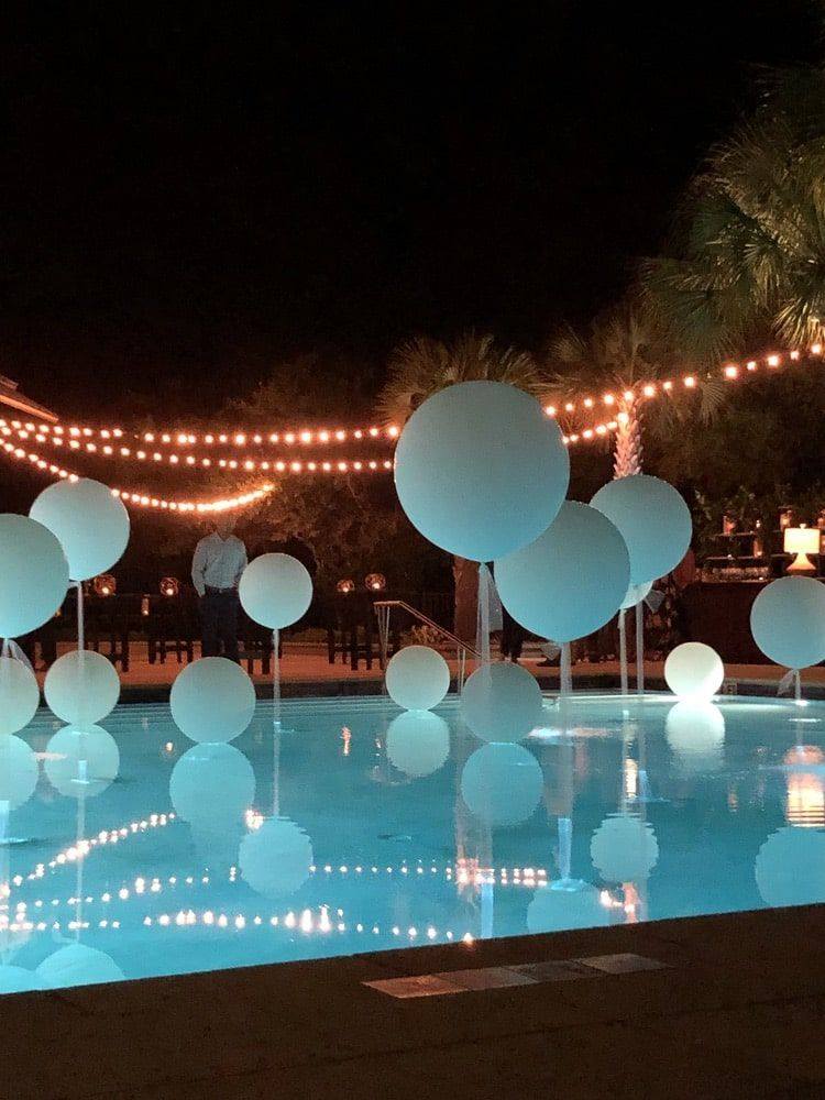 pool party decor ideas string lights and balloons