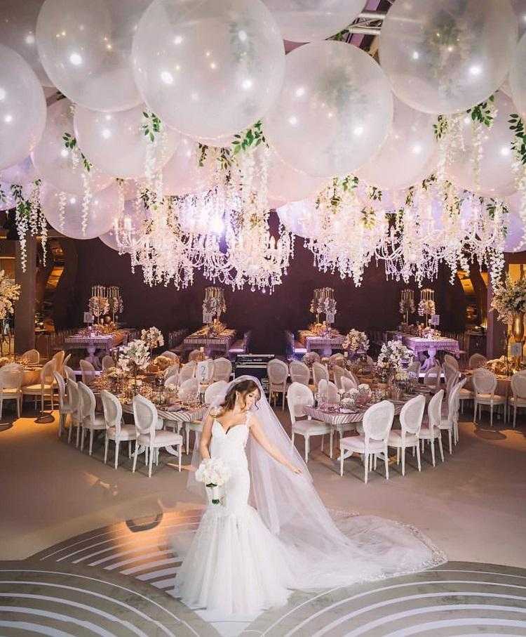 wedding decor ideas white balloons above dance floor