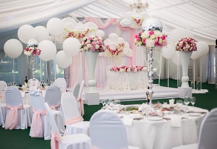 wedding venue decor with white balloons