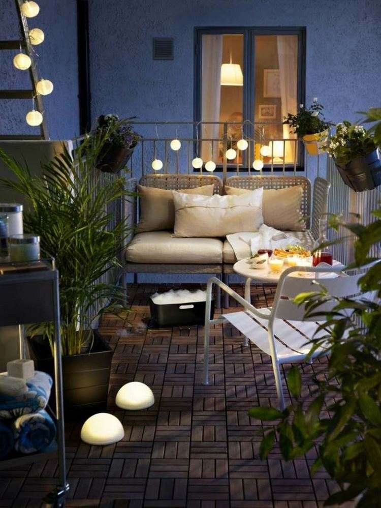 balcony ideas outdoor furniture string lights summer atmosphere