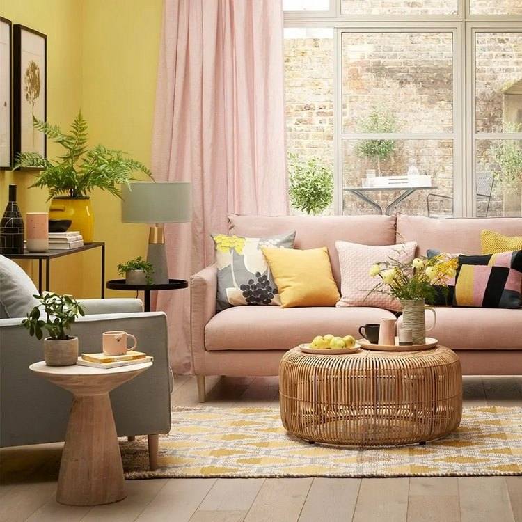 blush pink and yellow living room gray armchair
