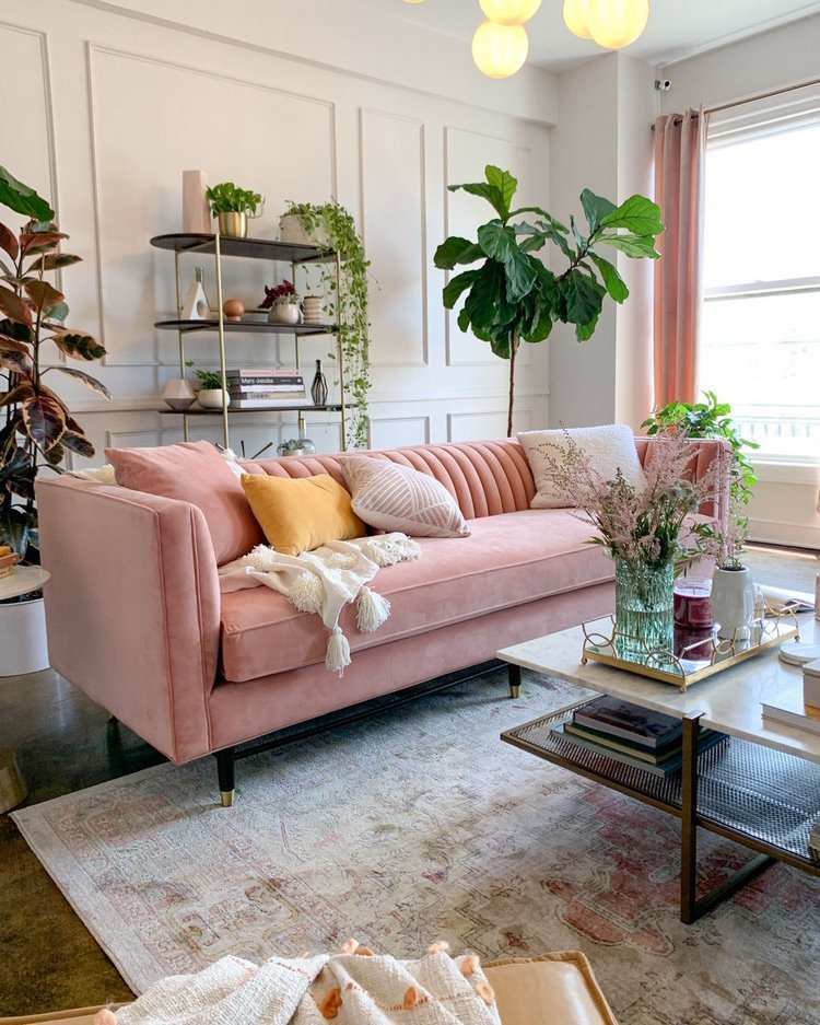 elegant living room with pink sofa