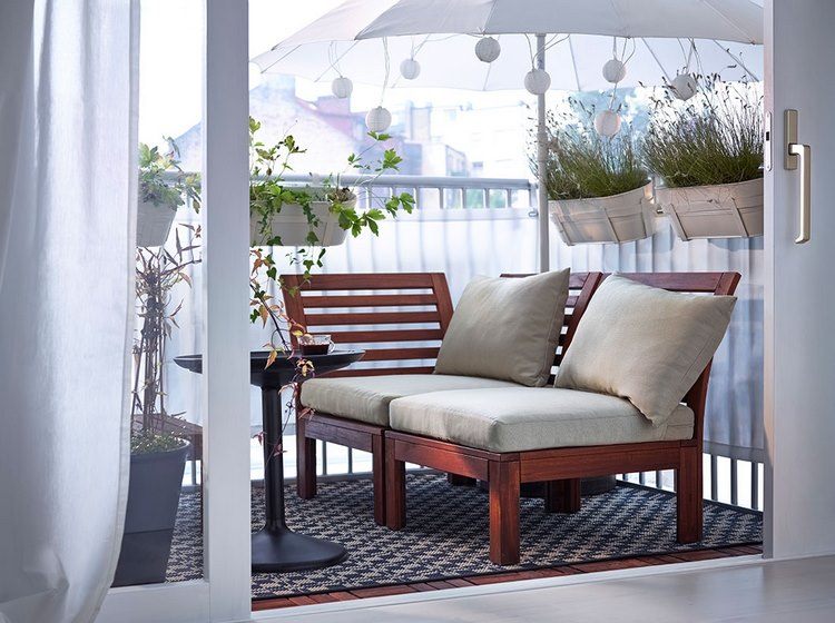 small balcony sofa and umbrella modern home exteriors
