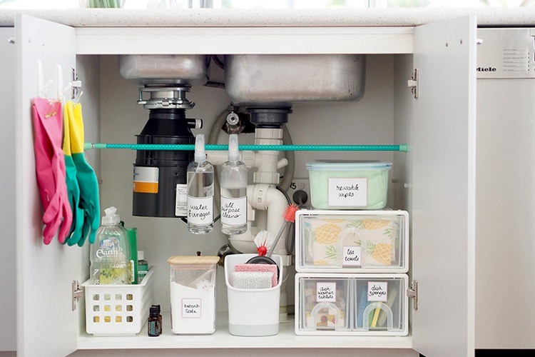 tension rod and containers storage under the sink