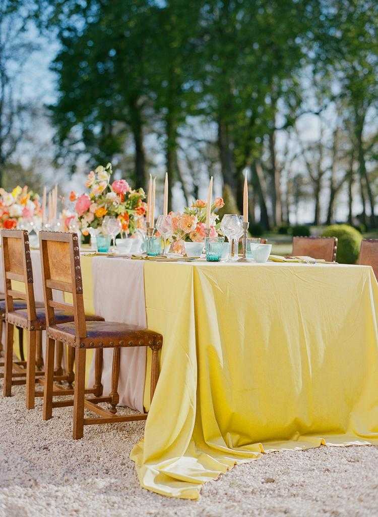 wedding table decor ideas yellow tablecloth floral centerpieces