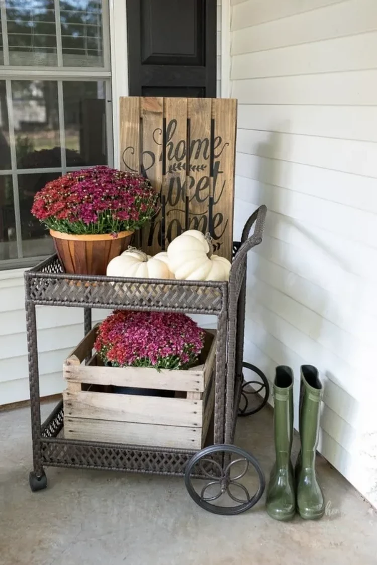 Rustic fall decoration with flowers and crates