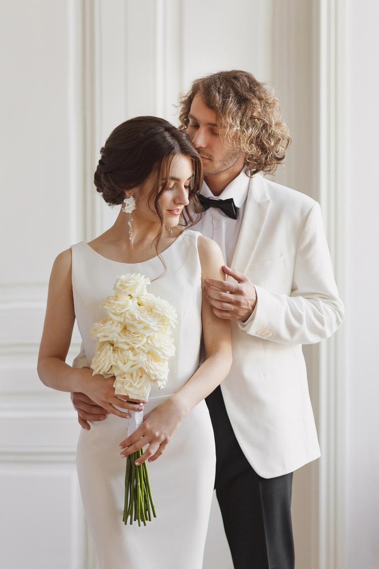 bride and groom attire for minimalist wedding