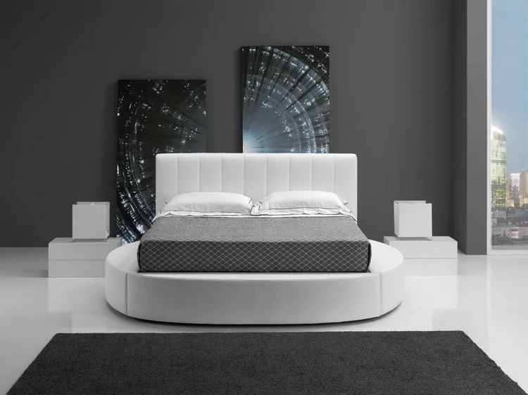 minimalist bedroom with round bed platform