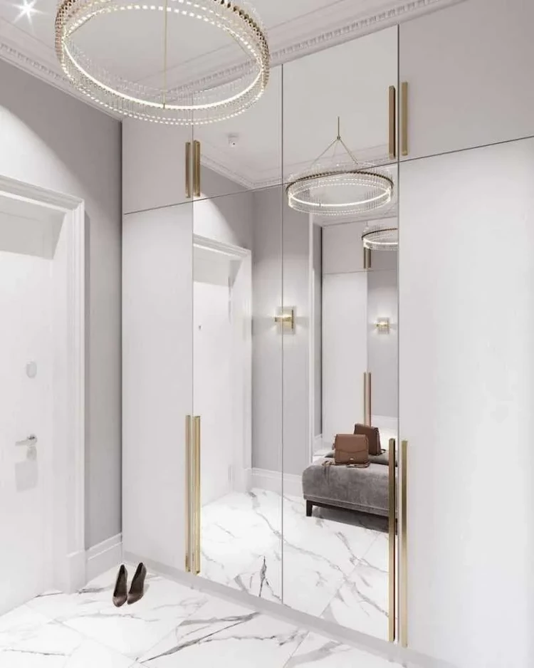 white marble flooring mirror doors small hallway ideas