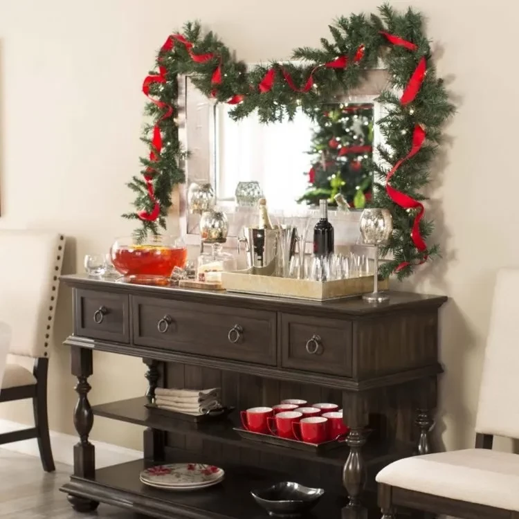 Decorate mirrors for Christmas with garland made of fir green