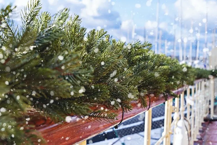 fir garland on balcony Christmas decor ideas