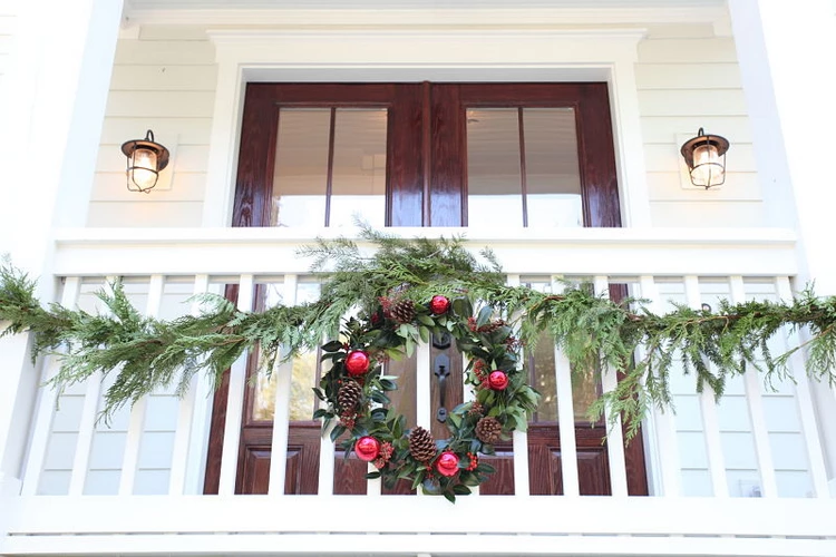 garland and wreath on the balcony festive christmas decor