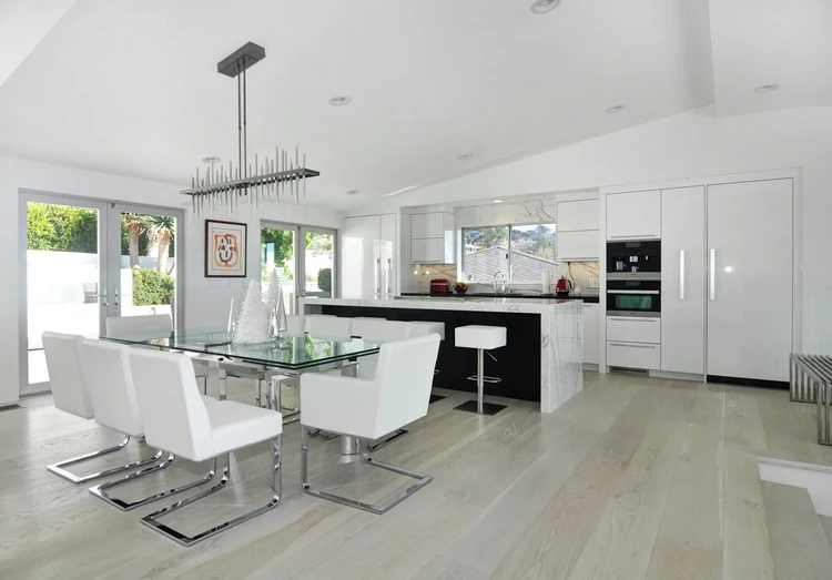open plan kitchen dining furniture glass table white leather chairs