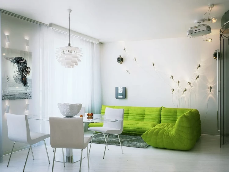 fresh green sofa as color accent in white living room