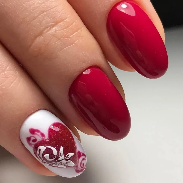manicura roja y blanca corazón arte de uñas