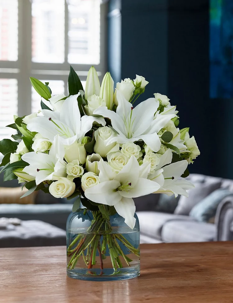 bouquet of white lilies for March 8th