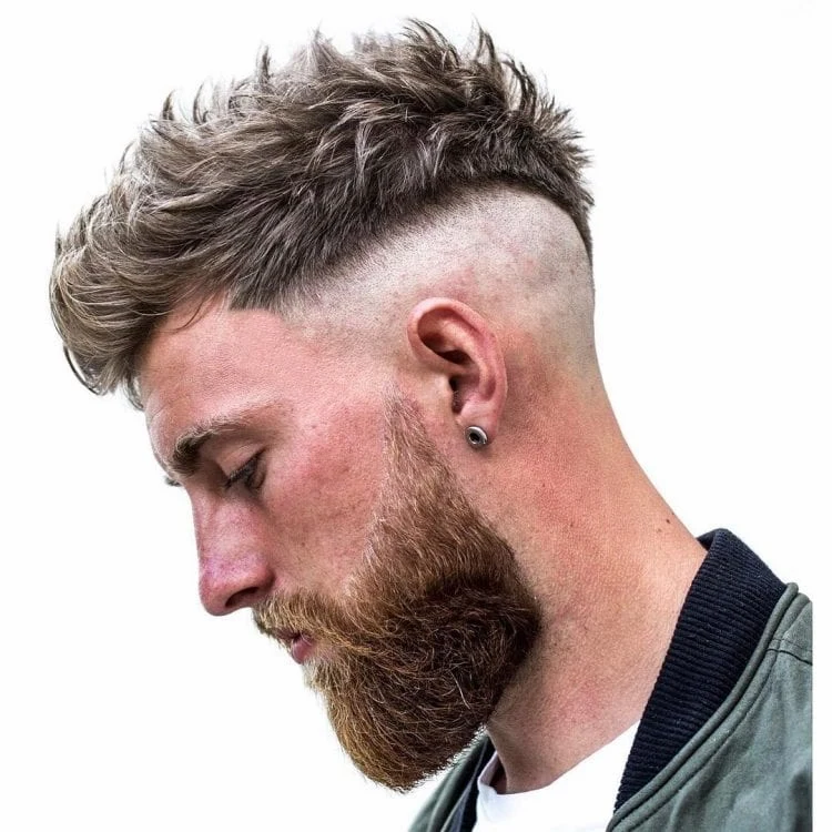 modern false mohawk cut with a beard in casual style