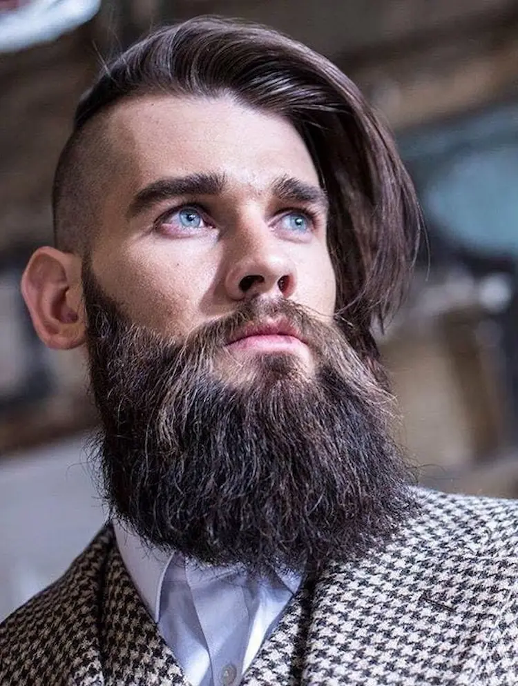 side undercut with full beard trendy combination for rock hairstyles men
