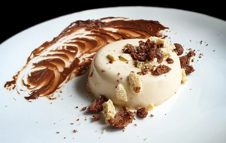 Cereal milk panna cotta with chocolate icing