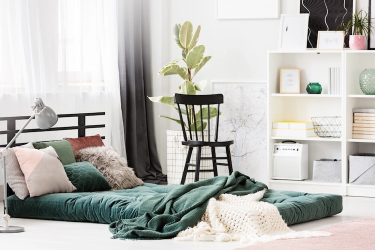 green plants as color accents in a minimalist bedroom